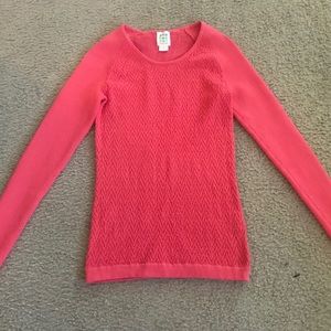 Fitted pink knit sweater
